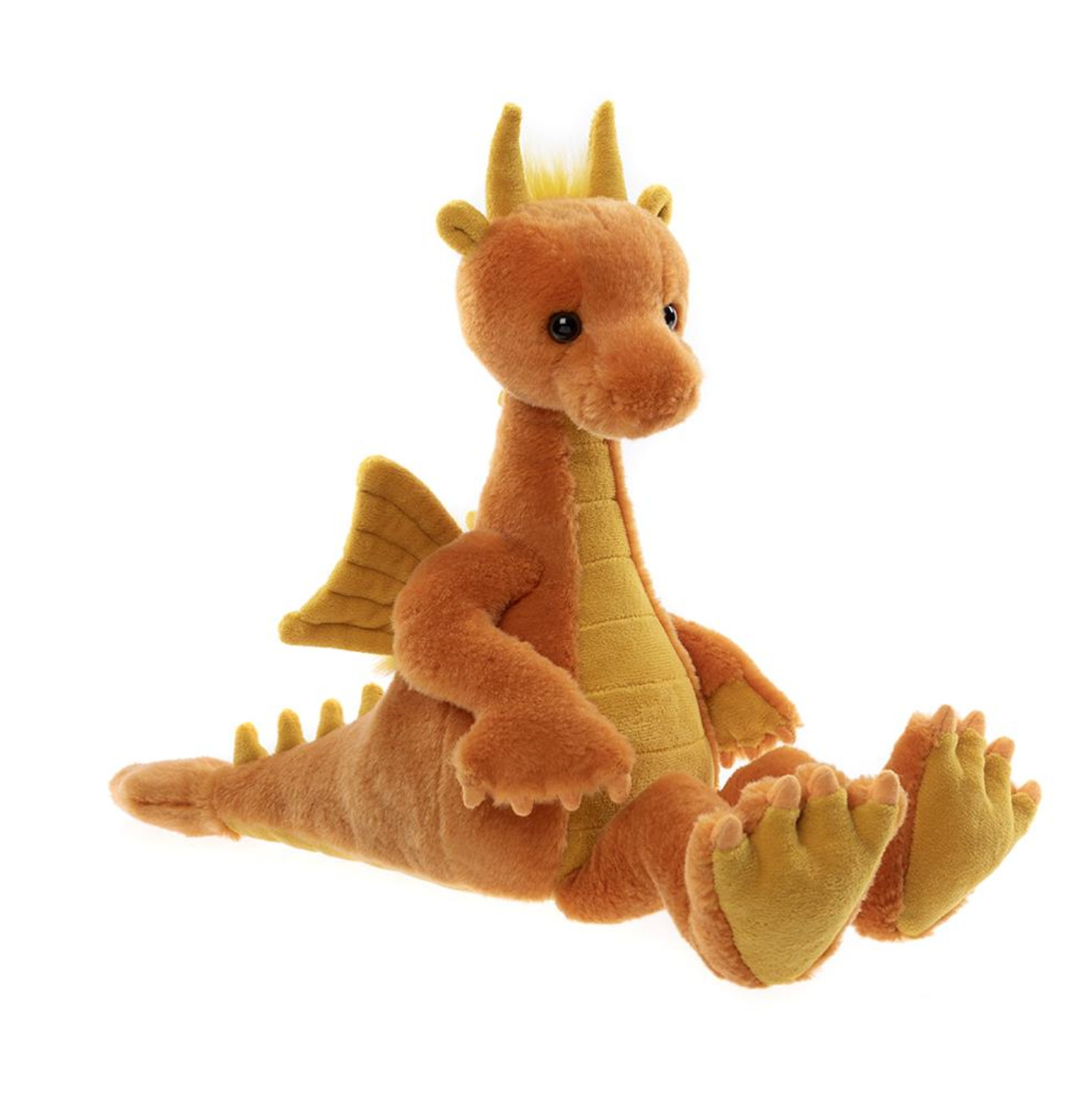 Plush dragon toy on a white background