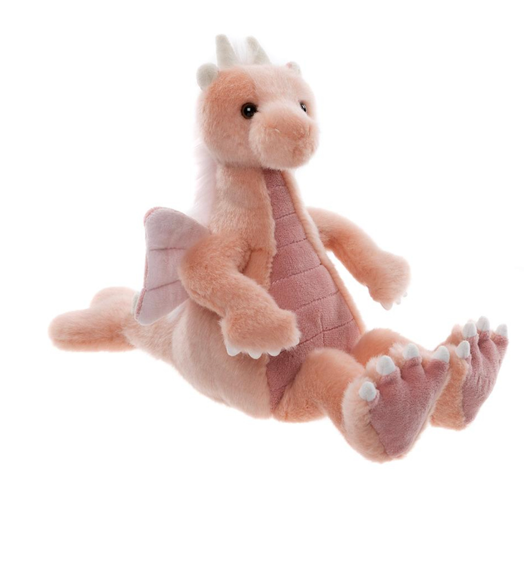Plush dragon toy on a white background