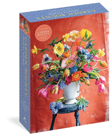 Garden Bounty puzzle box with colorful flowers and a vase on an orange background