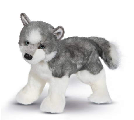 Plush toy wolf on a white background